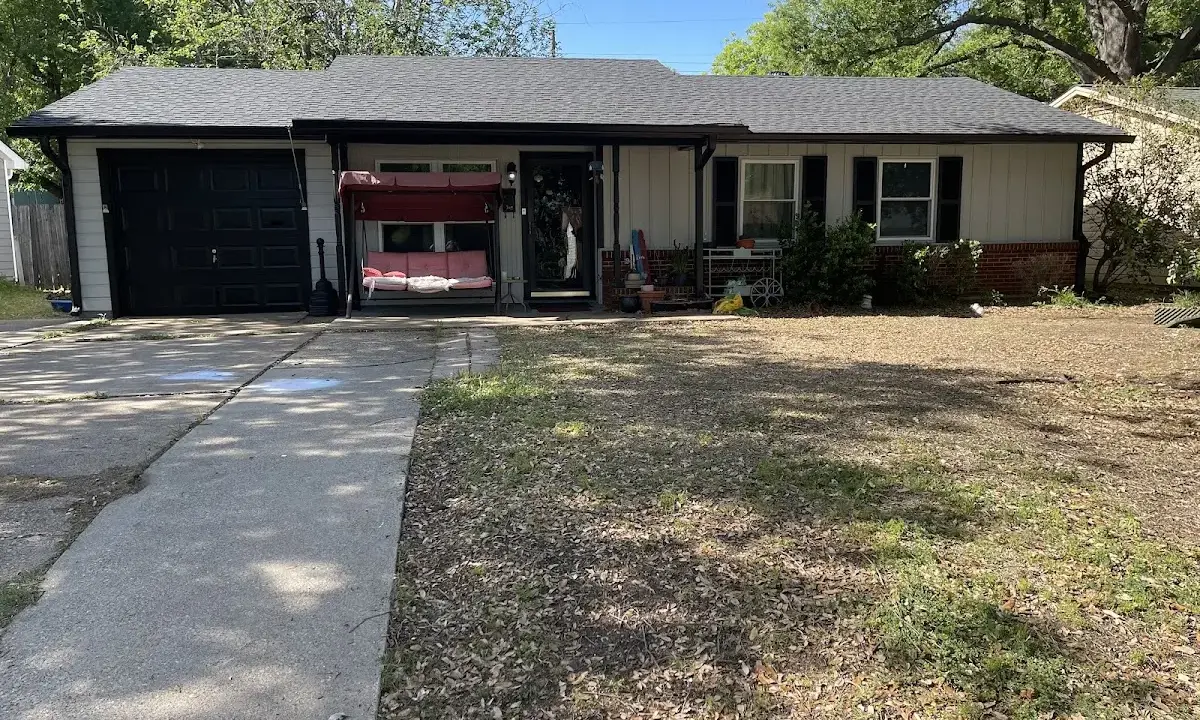 Asphalt Shingle Roof Repair crew at work on a residential roof in Talladega